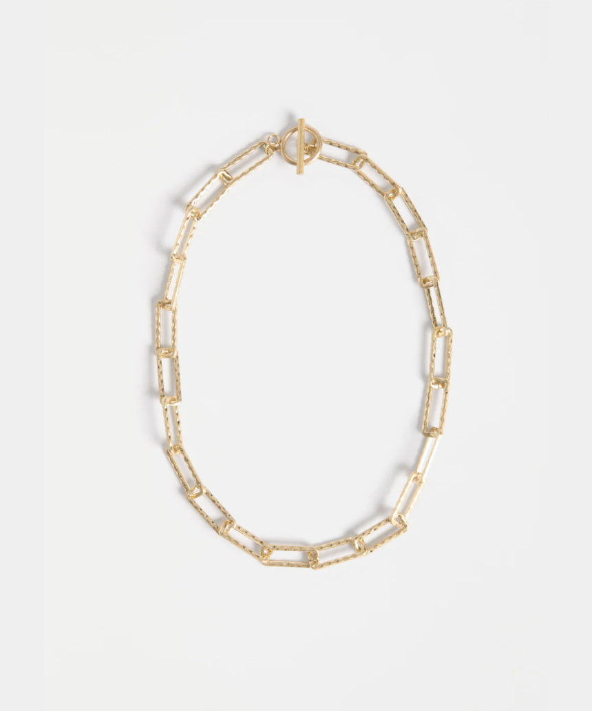 Gold Elk Ringva necklace showcasing a delicate chain with a sleek, modern pendant design.