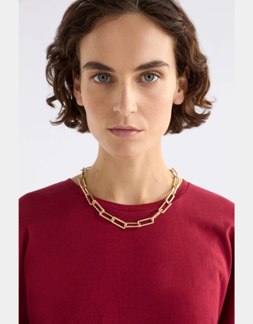 Gold Elk Ringva Necklace featuring a sleek, modern design, with a polished finish and delicate chain.