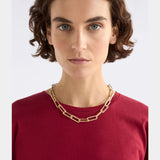 Gold Elk Ringva Necklace featuring a sleek, modern design, with a polished finish and delicate chain.