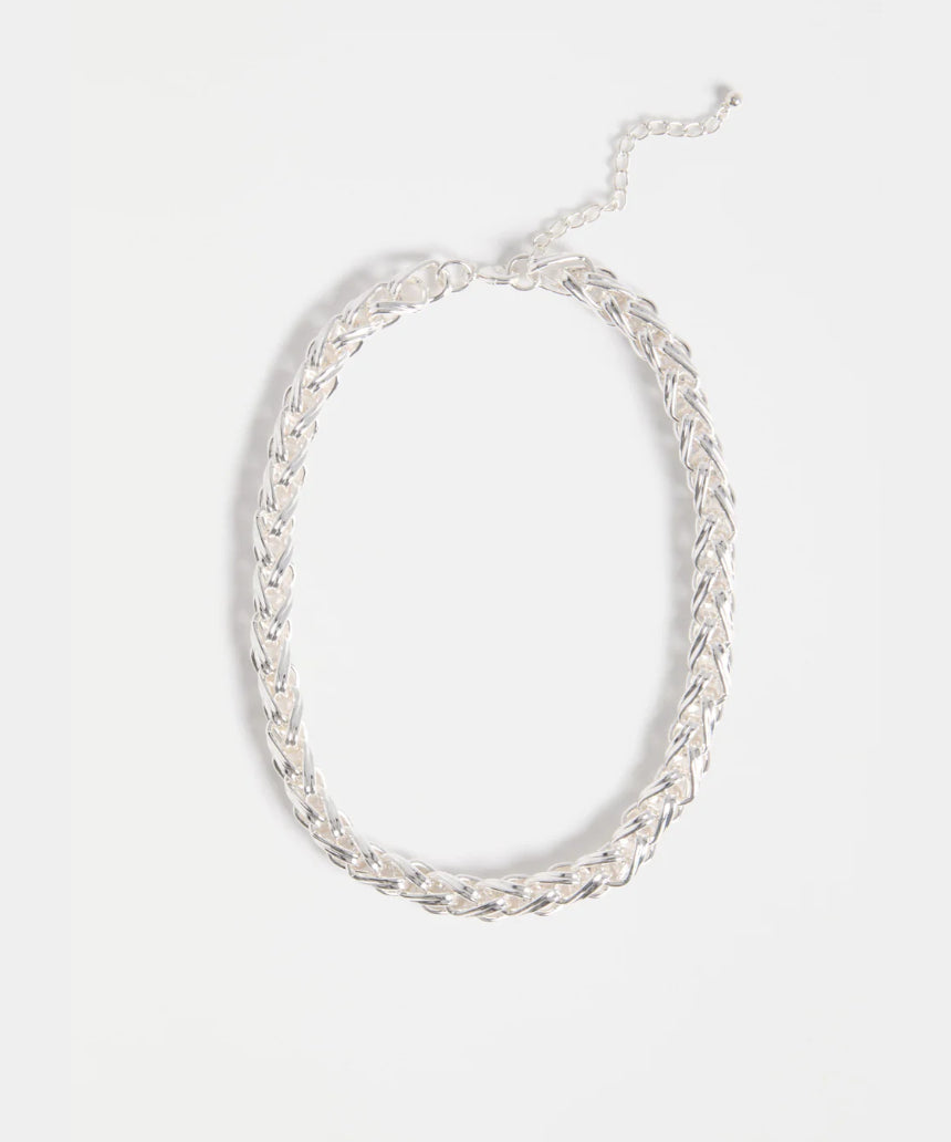 Silver Elk Samman Necklace with intricate pendant design, showcasing craftsmanship and elegant jewelry style.