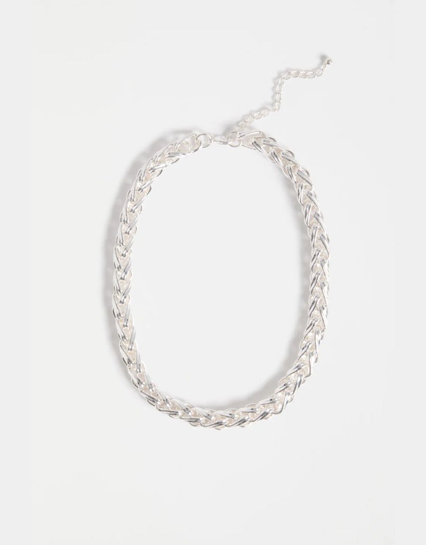 Silver Elk Samman Necklace with intricate pendant design, showcasing craftsmanship and elegant jewelry style.