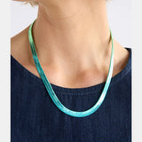 Elk Vera Short Necklace with green and blue ombre beads, showcasing a stylish and colorful accessory.