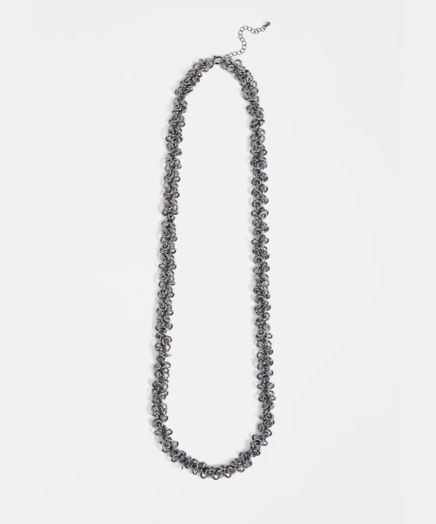 Elk Hava Necklace in gunmetal color, featuring a sleek and modern design, displayed on a neutral background.