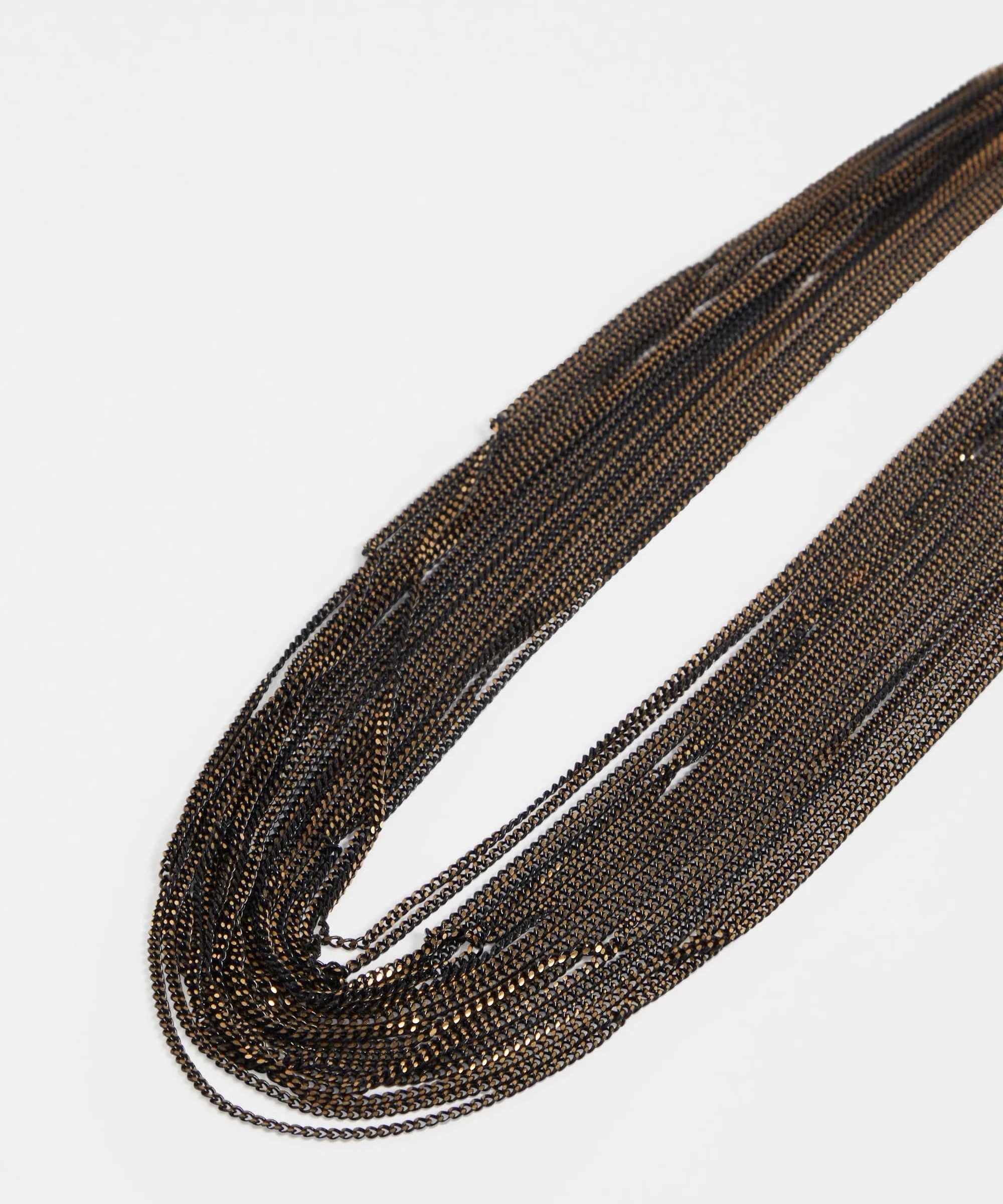 Elk Kade black necklace featuring sleek, minimalist design with a smooth pendant on a black cord.