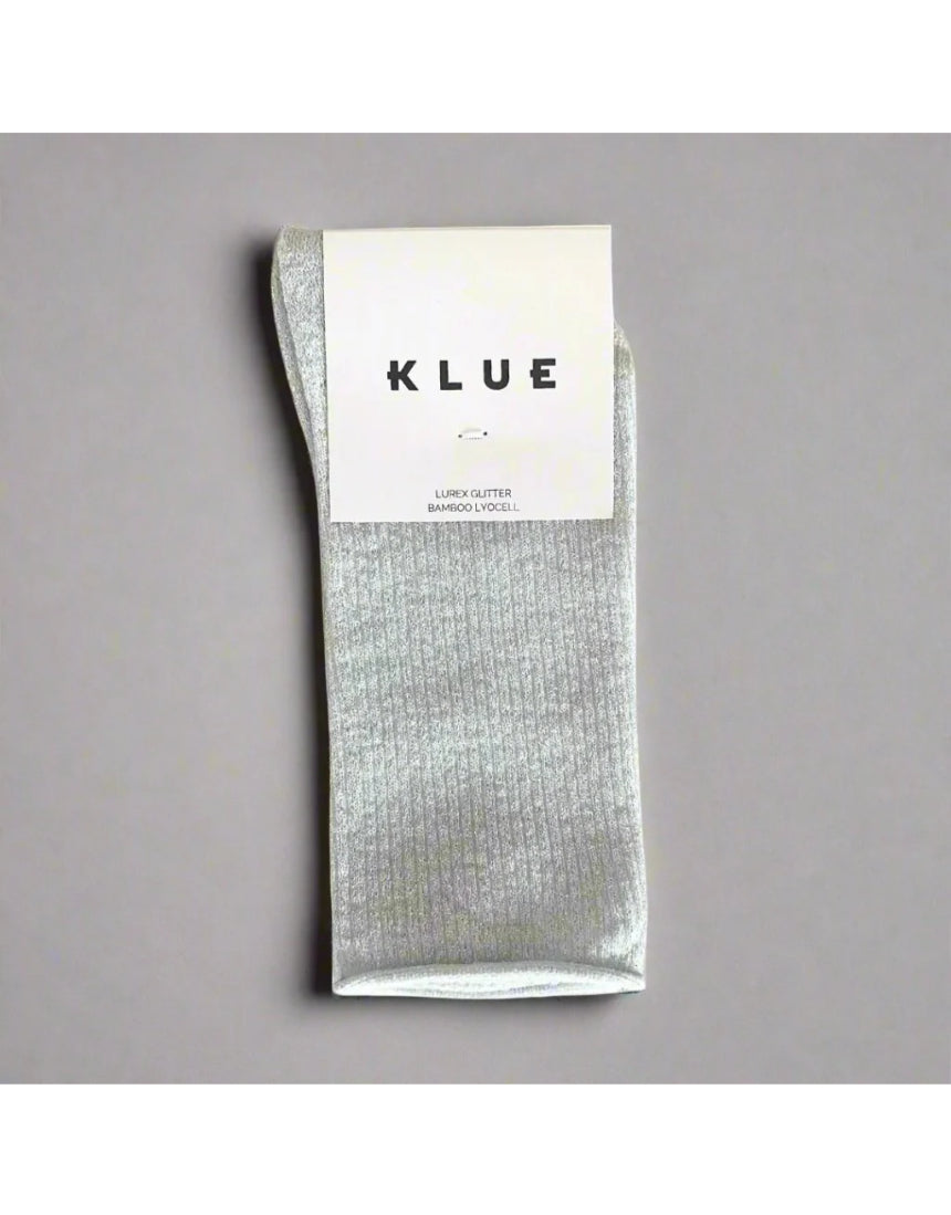 White Glitter Lurex Socks by Klue displayed in a packshot image, showcasing shiny, sparkly knit fabric and comfortable sock design.