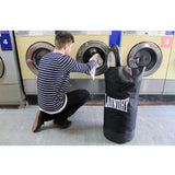 Suck UK Punch laundry bag with bold punch design, made of durable fabric for easy laundry storage and transport.