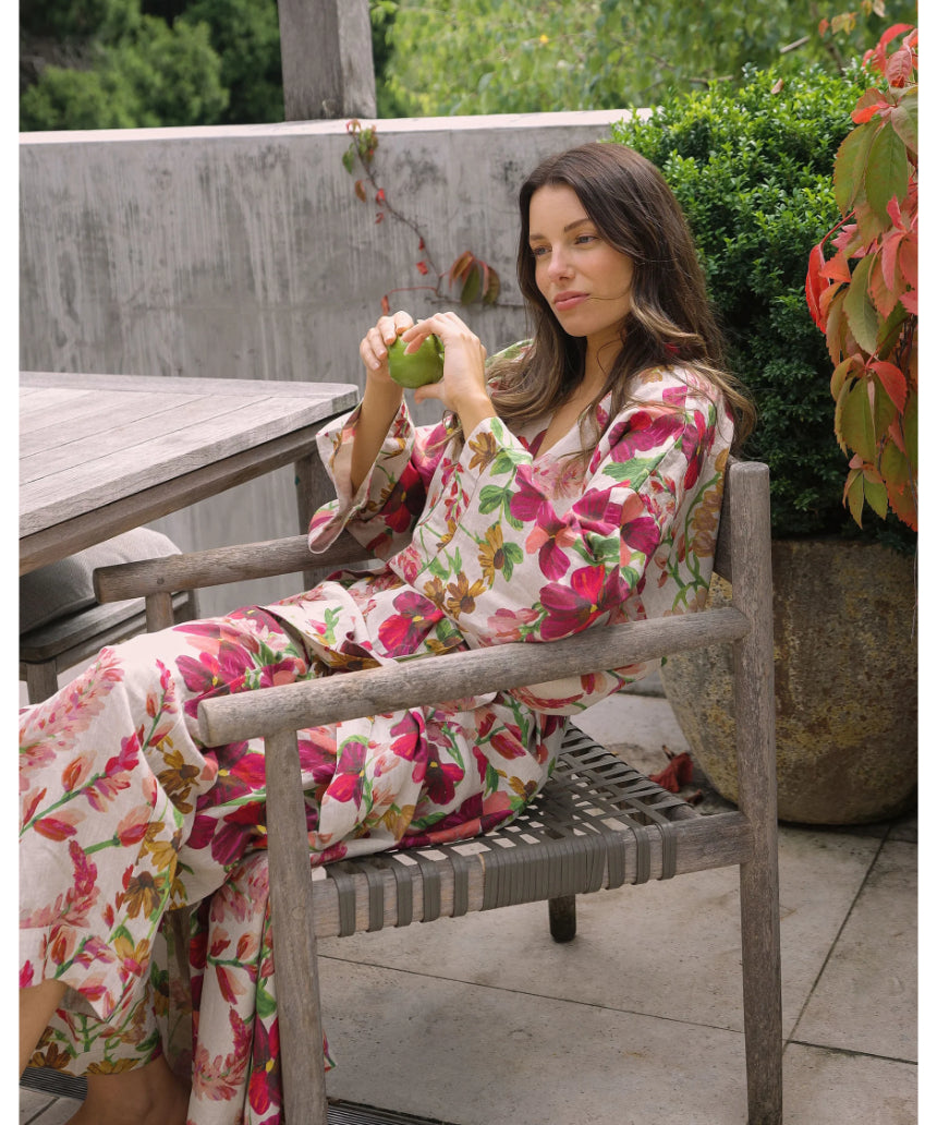 Bonnie and Neil Lupin Multi Linen Robe set in a bedroom, featuring a cozy, stylish linen robe with a floral pattern.