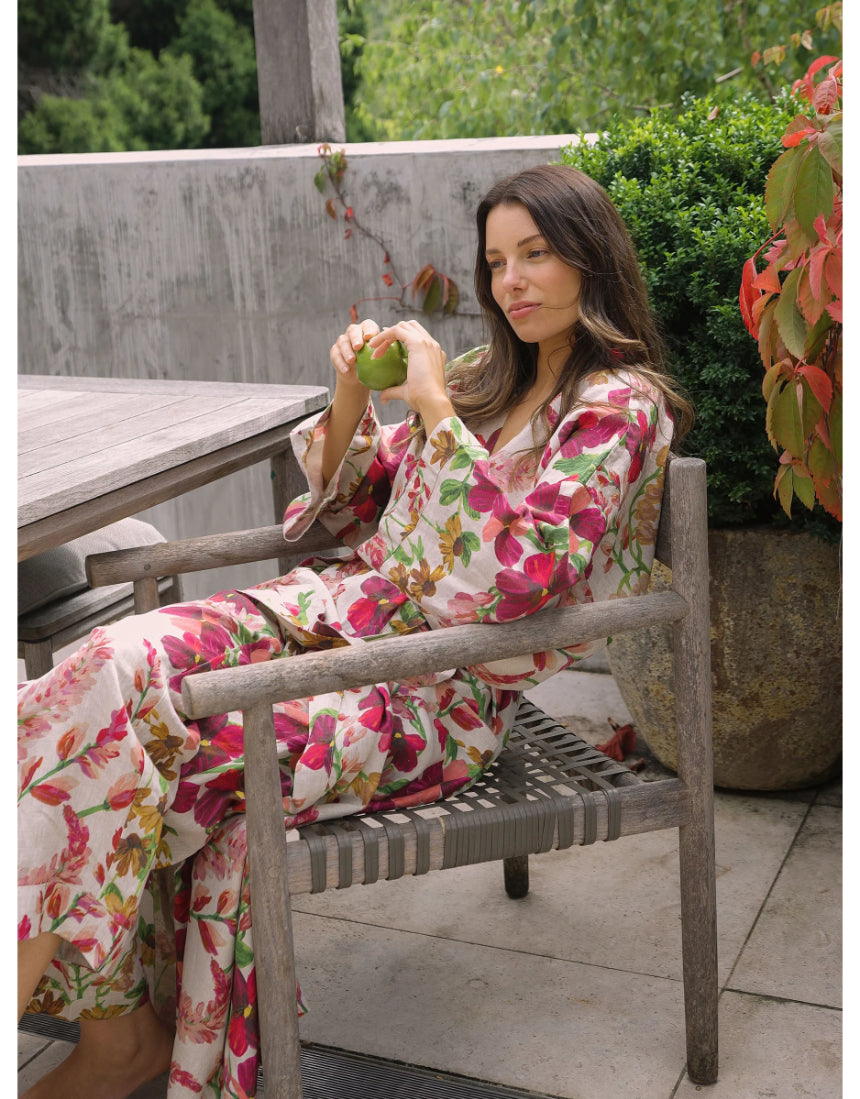 Bonnie and Neil Lupin Multi Linen Robe set in a bedroom, featuring a cozy, stylish linen robe with a floral pattern.
