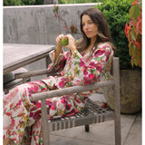 Bonnie and Neil Lupin Multi Linen Robe set in a bedroom, featuring a cozy, stylish linen robe with a floral pattern.