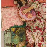 Bonnie and Neil Lupin Multi Linen Robe set displayed on a bed in a stylish bedroom setting.