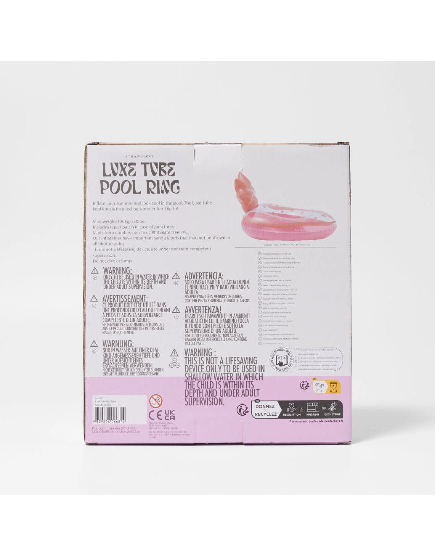 Sunnylife Luxe Pool Ring in strawberry pink floating on water, bright and fun pool float for summer relaxation.