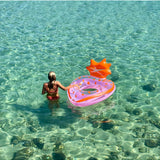 Sunnylife Luxe Pool Ring in strawberry pink, a fun inflatable pool float with a stylish design for summer swimming.