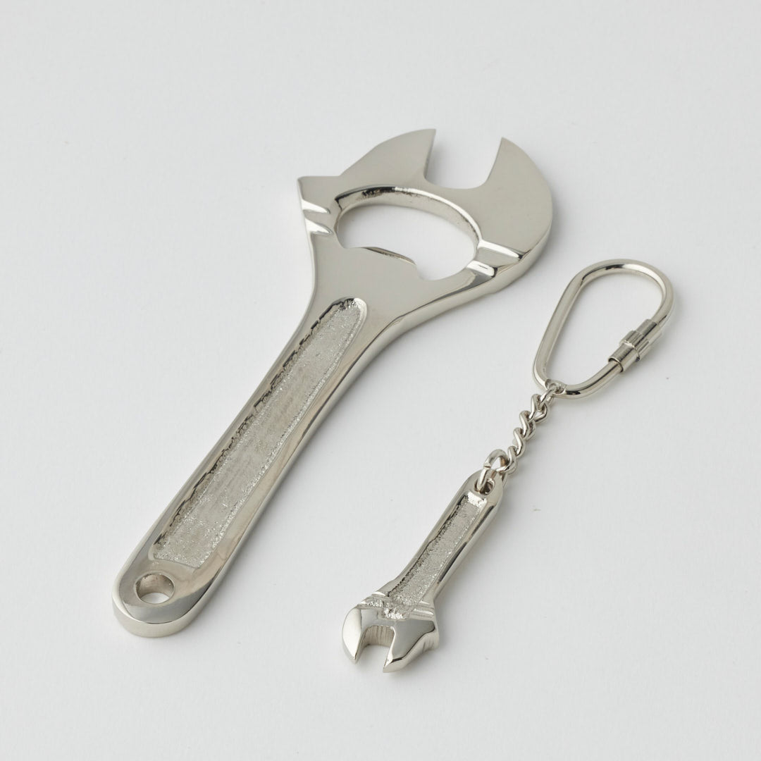 Pilbeam Living silver wrench-shaped bottle opener and keyring set, compact and stylish for everyday use and gifting.