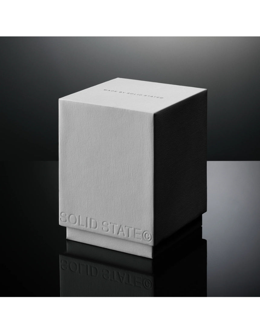 Solid State Wayfarer Extrait de Parfum cologne bottle with sleek design and minimalist label, showcasing luxury men's fragrance.
