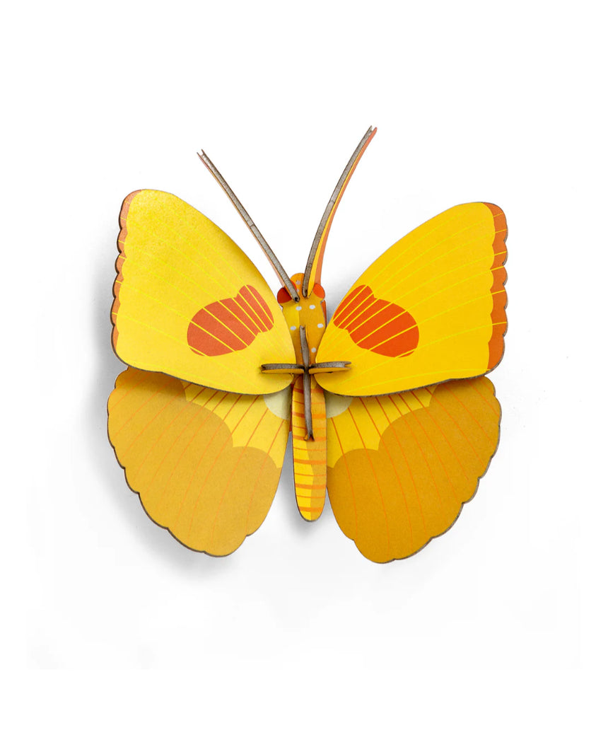 Yellow butterfly wall art from Studio Roof featuring a vibrant butterfly design on a decorative wall decor piece.