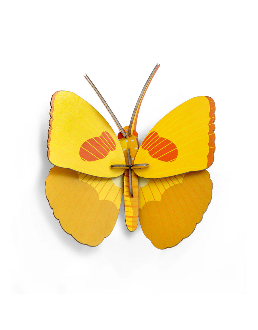 Yellow butterfly wall art from Studio Roof featuring a vibrant butterfly design on a decorative wall decor piece.