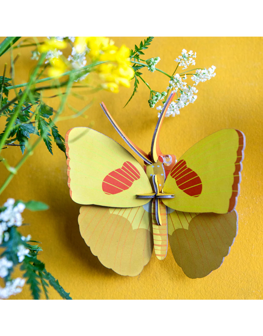 Yellow butterfly wall art by Studio Roof featuring a vibrant butterfly design on a wall decor piece.