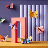 Yellow butterfly wall art by Studio Roof featuring vibrant butterflies on a decorative wall decor piece.