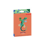 Studio Roof wall decor featuring a vibrant jungle gecko illustration, ideal for adding a lively touch to any room.