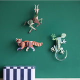 Studio Roof wall art featuring a colorful jungle gecko, a vibrant piece of wall decor for adding tropical style to any space.