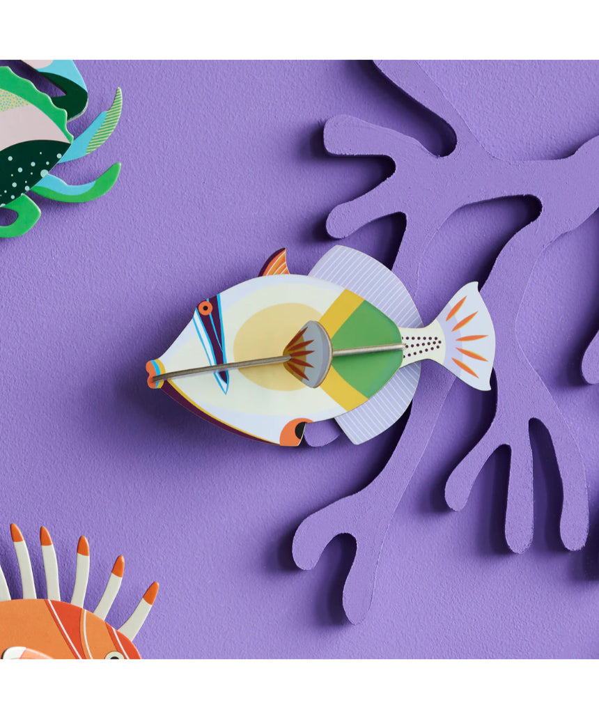 Studio Roof wall art featuring a colorful Lagoon Triggerfish, vibrant marine sea creature wall decor for ocean-themed interior design.