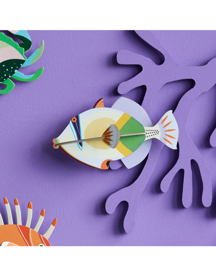 Studio Roof wall art featuring a colorful Lagoon Triggerfish, vibrant marine sea creature wall decor for ocean-themed interior design.