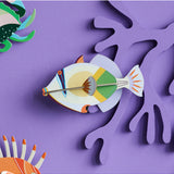 Studio Roof wall art featuring a colorful Lagoon Triggerfish, vibrant marine sea creature wall decor for ocean-themed interior design.
