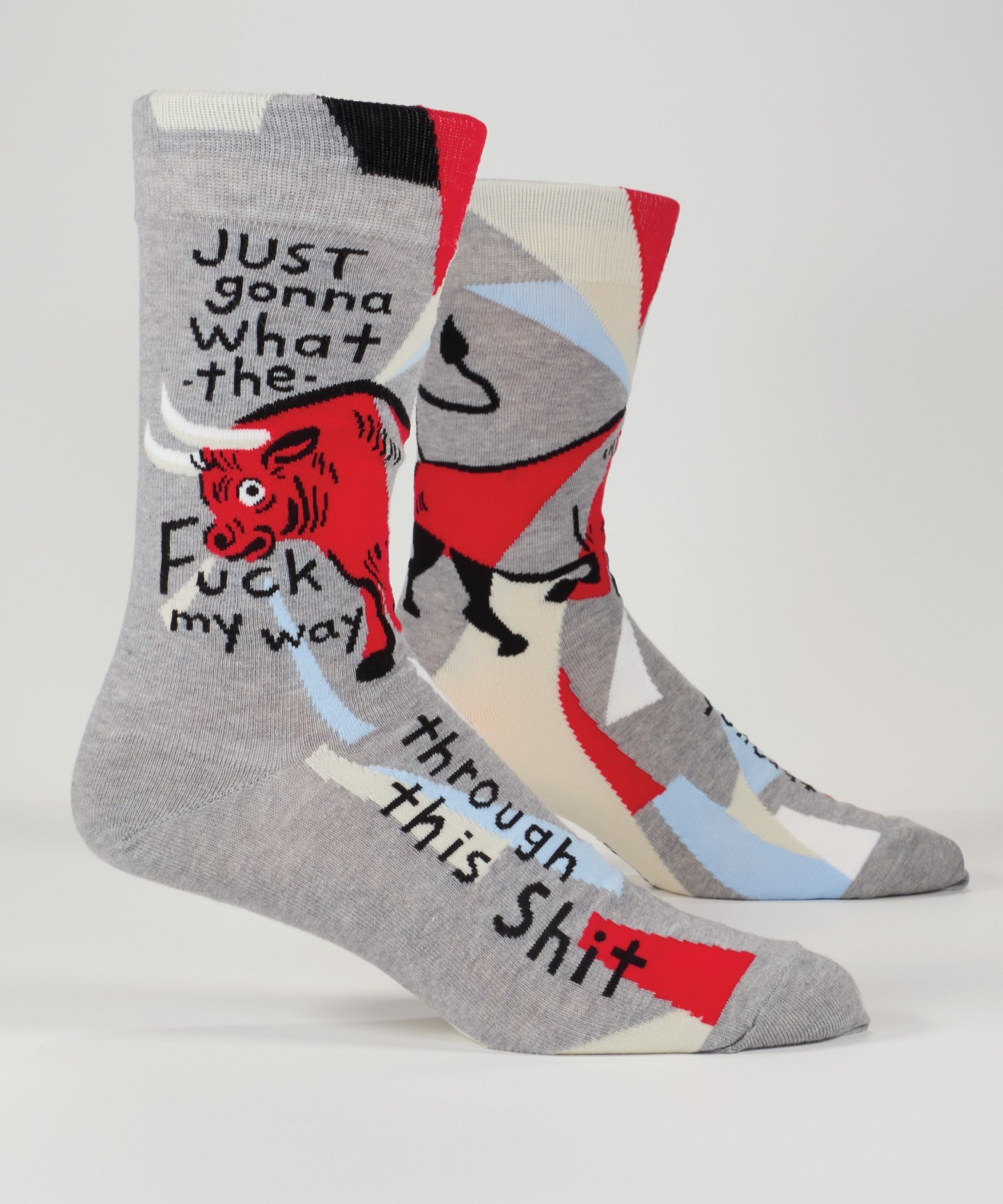 Blue Q men's socks featuring a humorous "WTF My Way Through" design, made of comfortable fabric with colorful patterns.