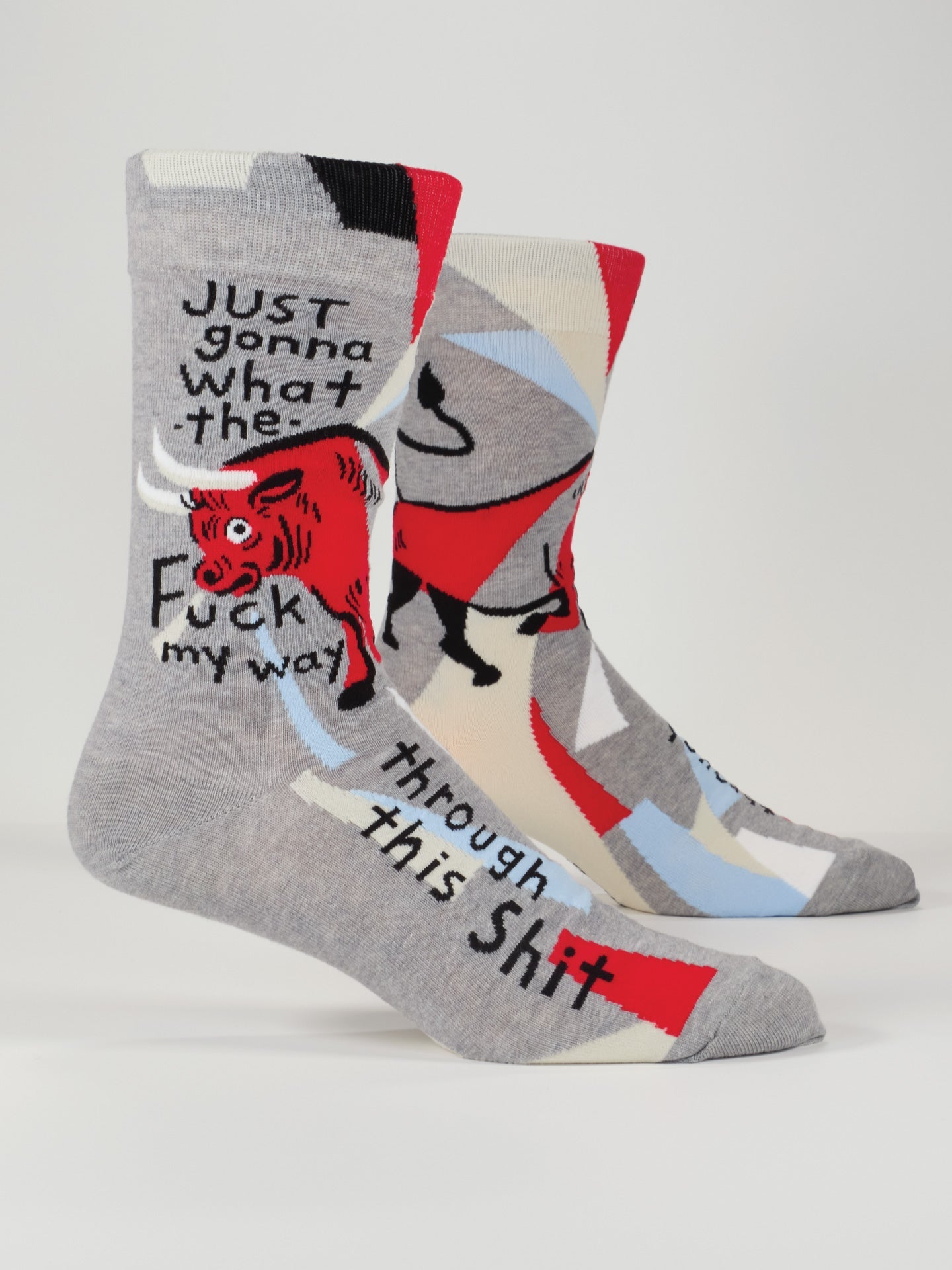 Blue Q men's socks featuring a humorous "WTF My Way Through" design, made of comfortable fabric with colorful patterns.