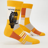 Blue Q men's crew socks featuring a witty design with the Wiseass slogan, made of comfortable, colorful fabric.