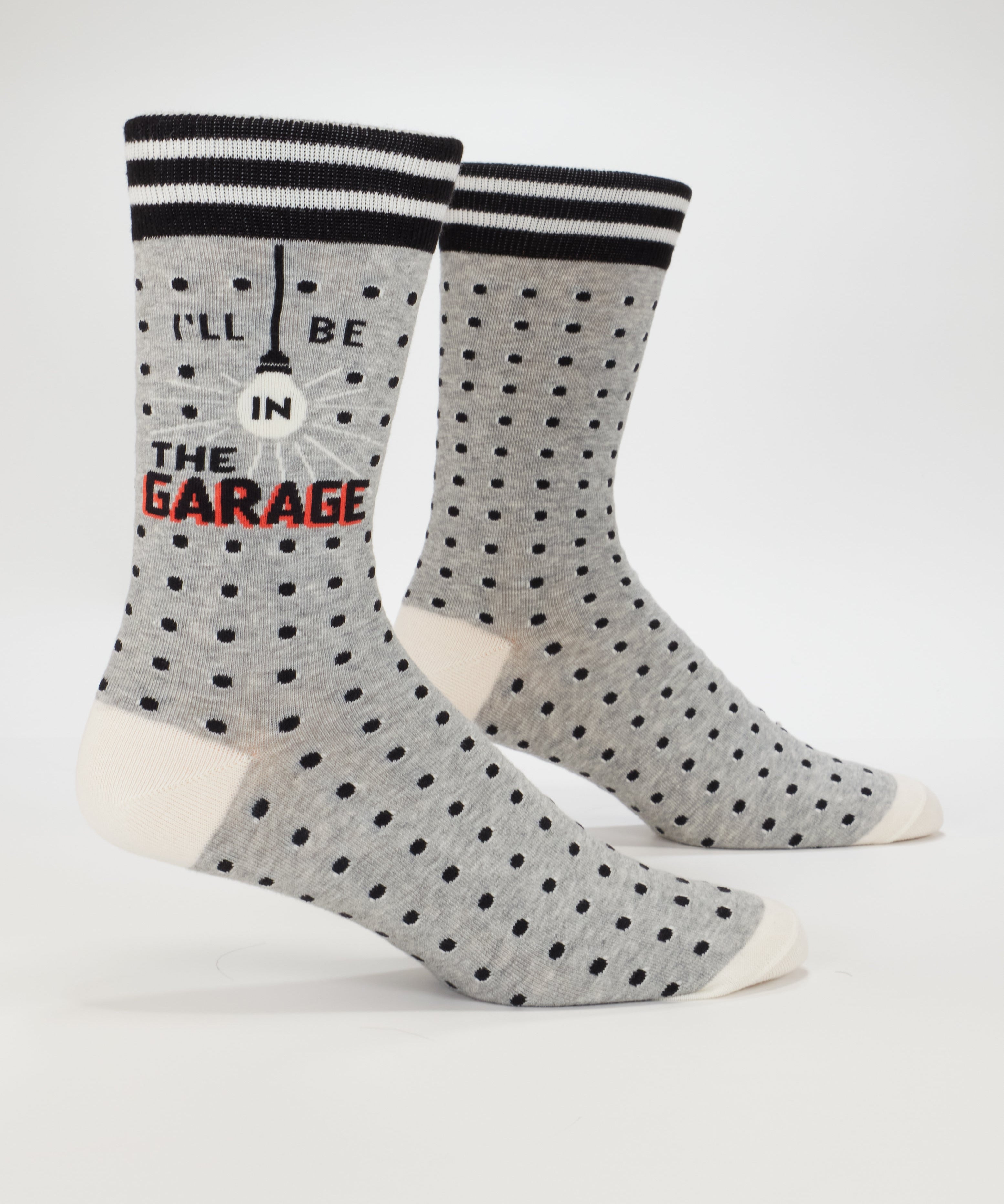 Blue Q men's crew socks featuring a garage-themed design with humorous text, perfect for casual wear.