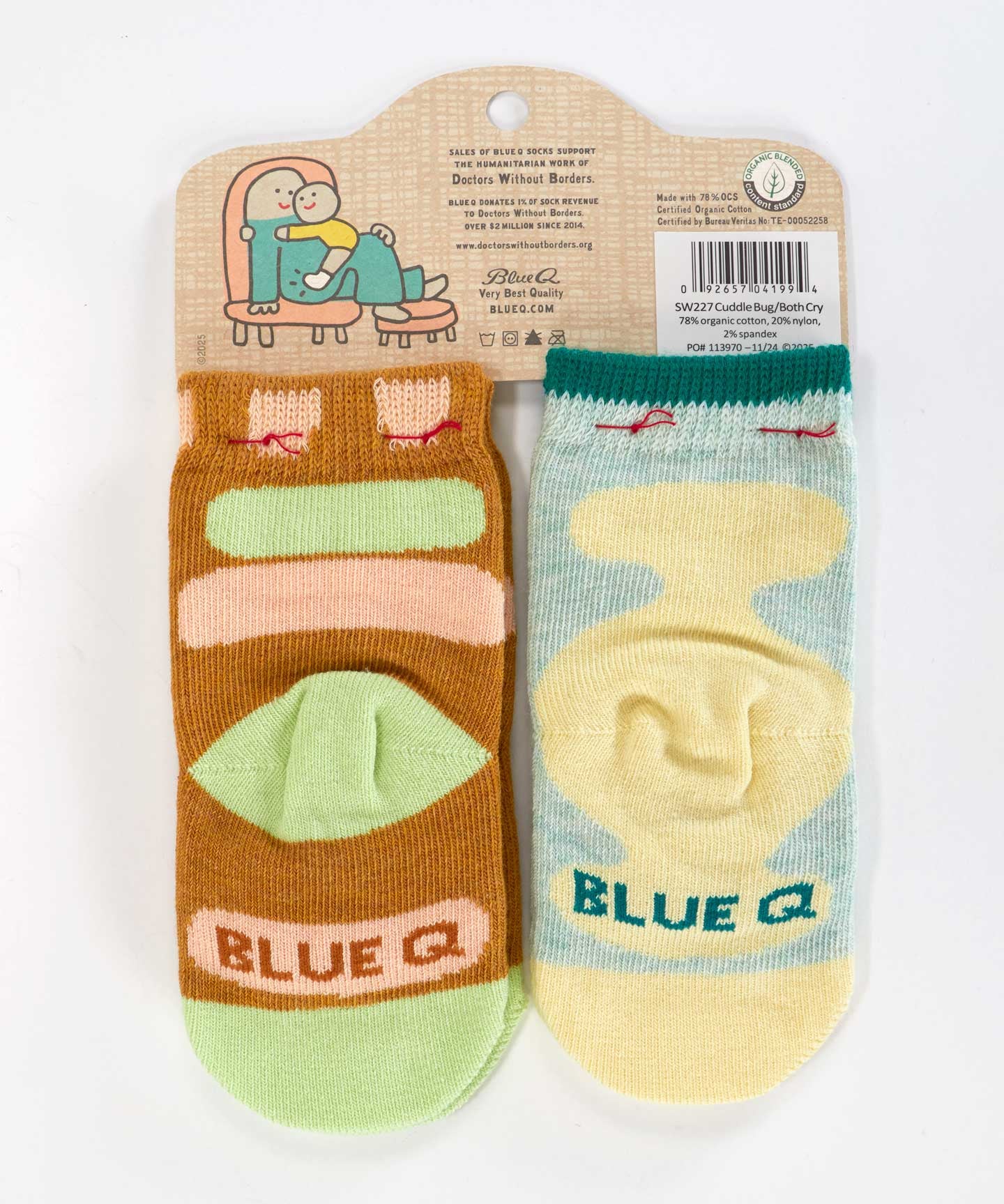 Blue Q baby socks featuring adorable cuddle bug and crying baby designs, soft and comfortable for little feet.