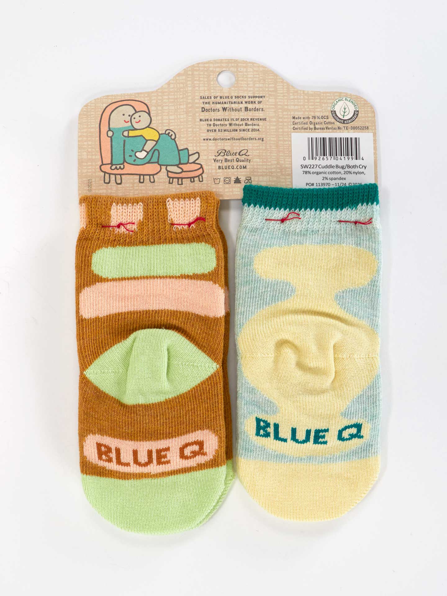Blue Q baby socks featuring adorable cuddle bug and crying baby designs, soft and comfortable for little feet.