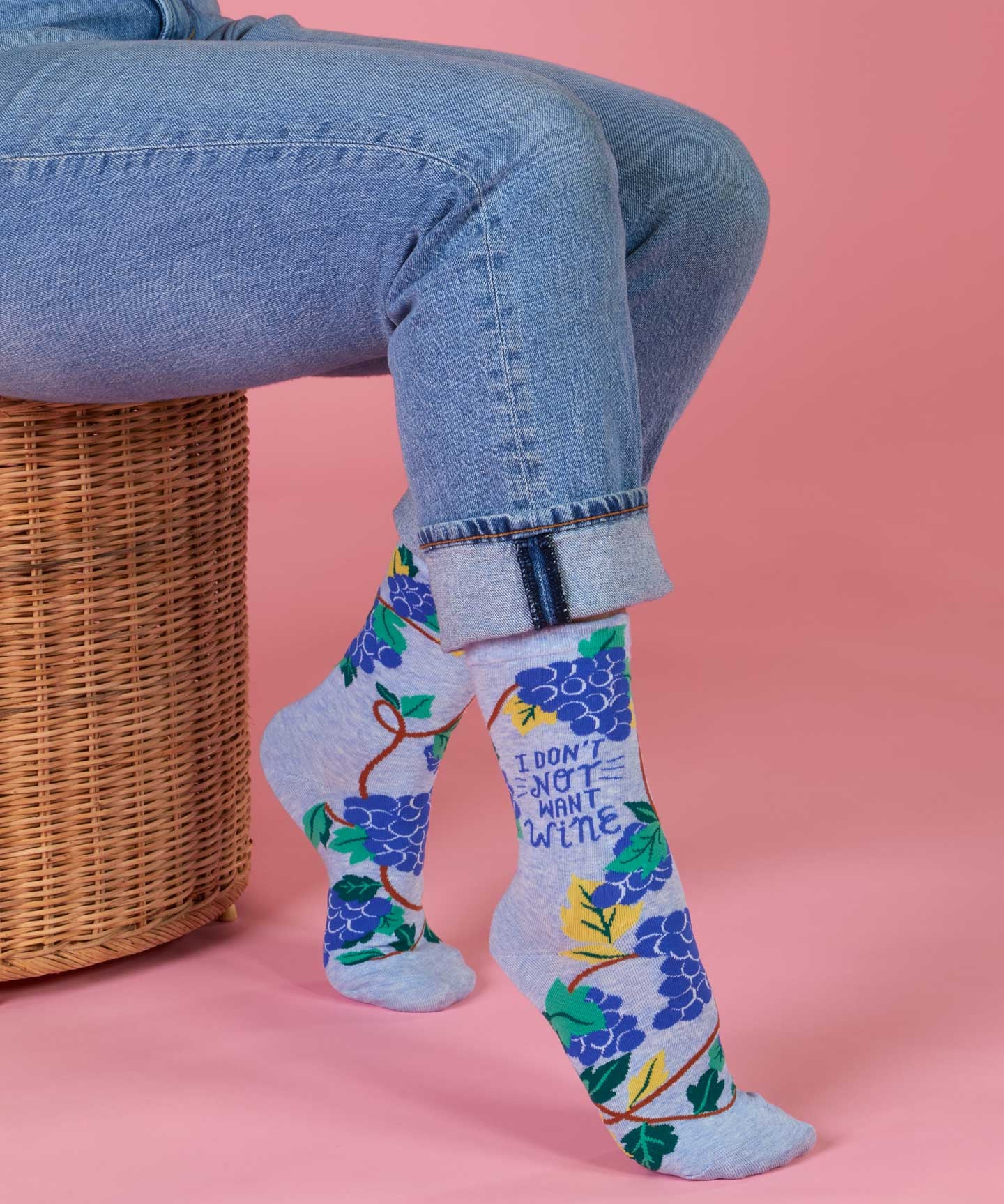 Blue Q ladies crew socks featuring a playful design and "Don't Not Want Wine" slogan, perfect for casual wear.