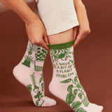 Blue Q ladies crew socks featuring colorful plant-themed design, perfect for plant lovers and casual wear.