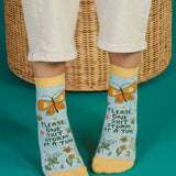 Blue Q ankle socks featuring a colorful "Shitstorm" design, made from soft fabric for comfortable wear.