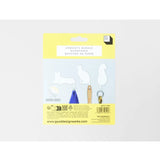 Suck UK Hooks Cat wall hooks in the shape of a playful cat, made of metal with a minimalist design for hanging items.