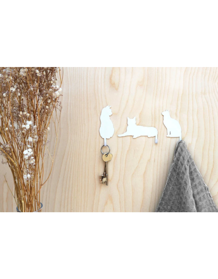 Suck UK Hooks Cat wall hook featuring a playful cat design, made of metal with a sleek finish for hanging items.