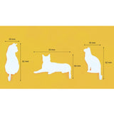 Suck UK Hooks Cat wall hooks shaped like playful cats with outstretched paws, ideal for hanging items in modern home decor.