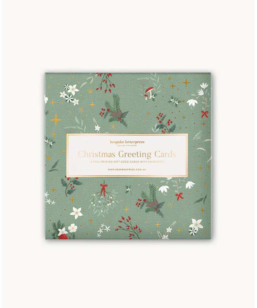Bespoke Letterpress Christmas Village 12-pack square greeting card box set with festive holiday illustrations and elegant design.