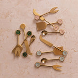 Bonnie and Neil Petal Pink brass teaspoon from the cutlery set, featuring a delicate floral design and a polished finish.