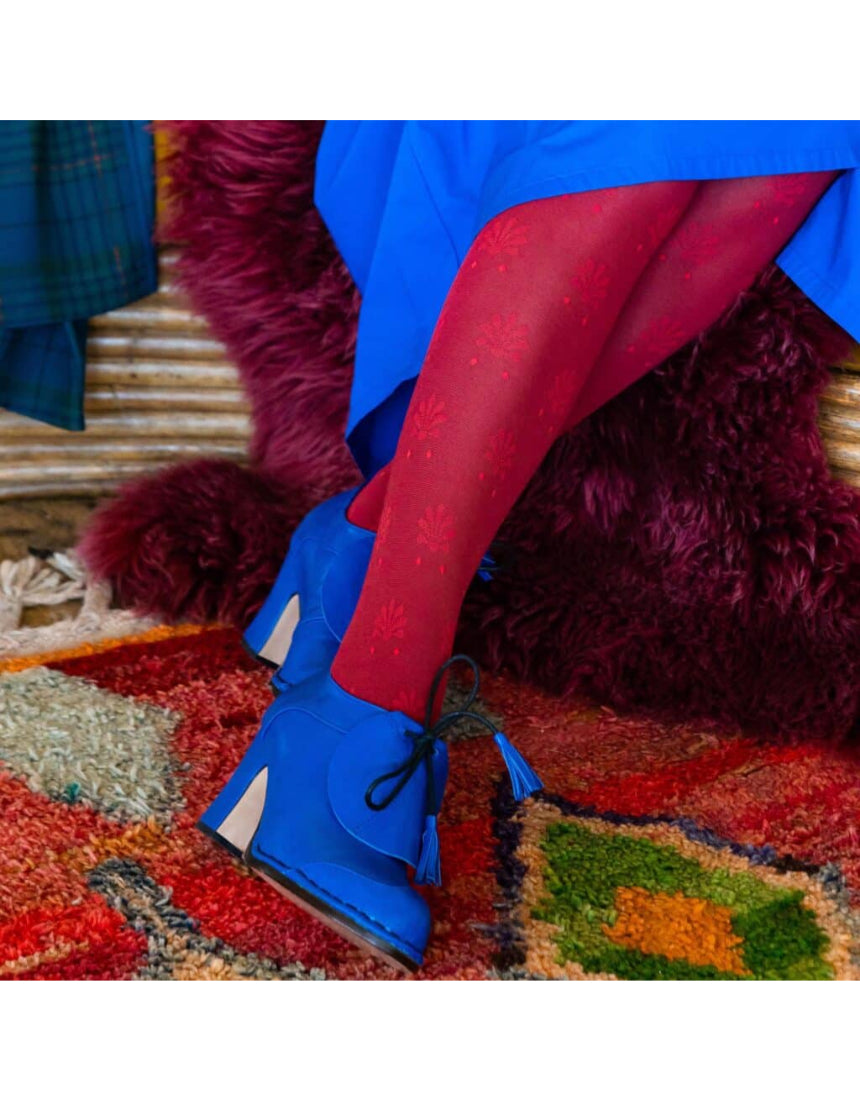 Close-up of Tightology Fleur organic cotton tights showing soft texture and floral pattern in natural light.
