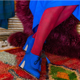 Close-up of Tightology Fleur organic cotton tights showing soft texture and floral pattern in natural light.