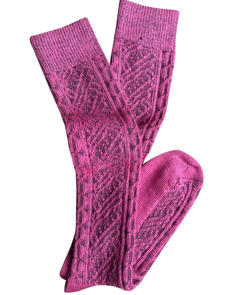 Pink vintage Merino wool socks by Tightology featuring a long, cozy design perfect for cold weather.