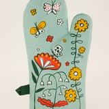 Blue Q oven mitt in the Shitstorm design featuring colorful, humorous graphics for kitchen protection and style.