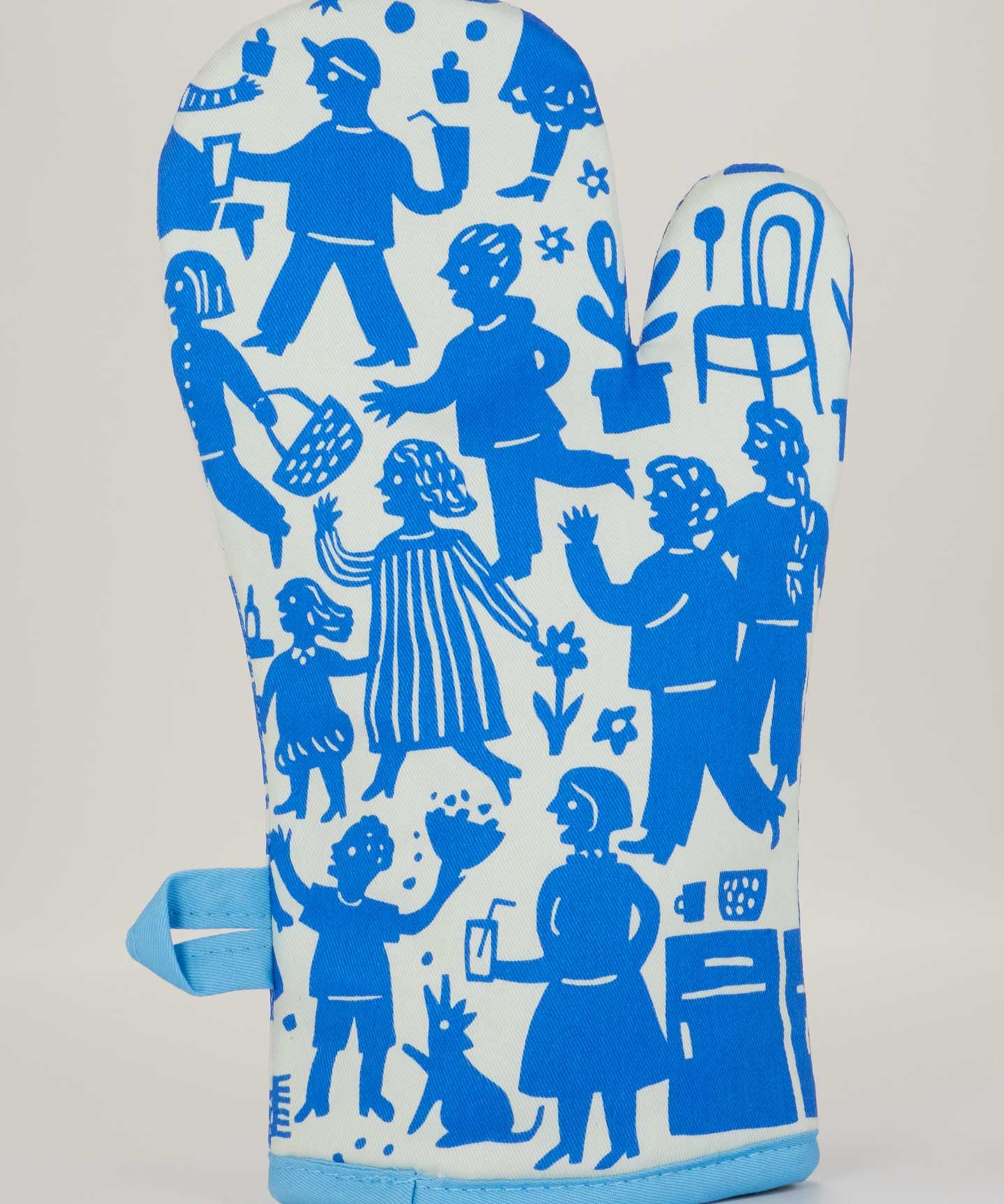 Blue Q oven mitt featuring a colorful party in the kitchen design, made of heat-resistant fabric for safe handling of hot cookware.