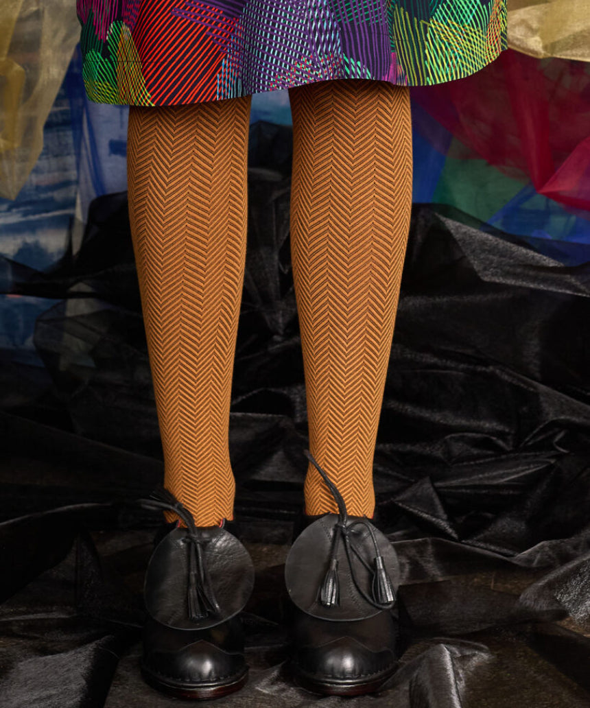 Weave organic cotton tights in butterscotch color by Tightology, featuring a close-up of the woven texture and smooth finish.