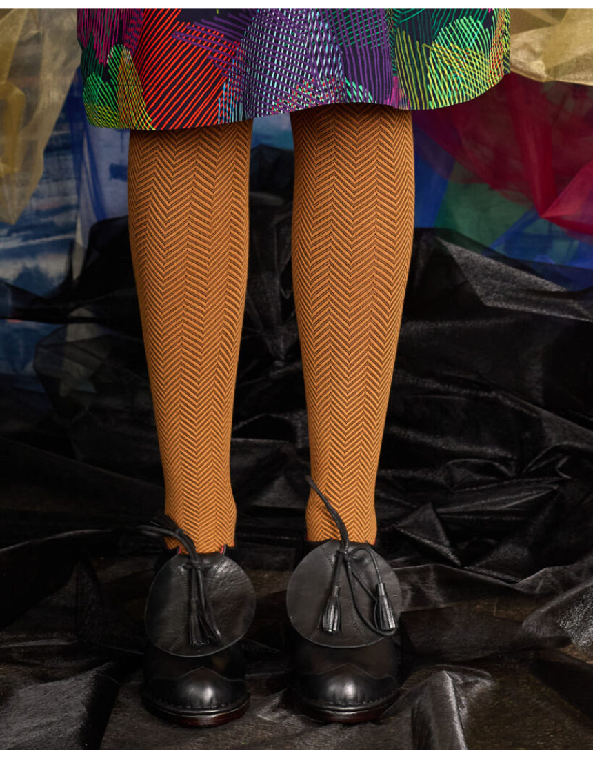 Weave organic cotton tights in butterscotch color by Tightology, featuring a close-up of the woven texture and smooth finish.