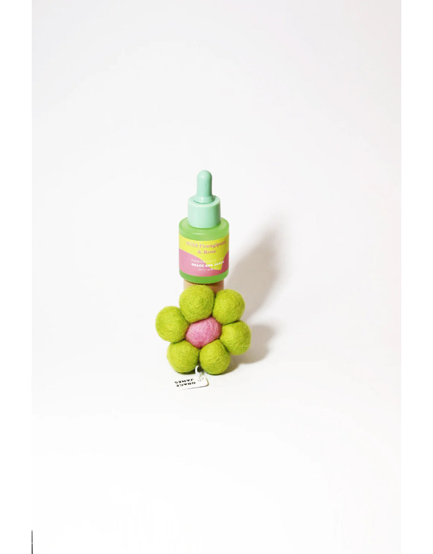Grace & James Frangipani and Rose felt air freshener with floral design and natural scent, showcasing its decorative and aromatic qualities.