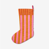 Bonnie and Neil stripe tan pink Christmas stocking made of cotton, festive holiday decoration with a cozy design.